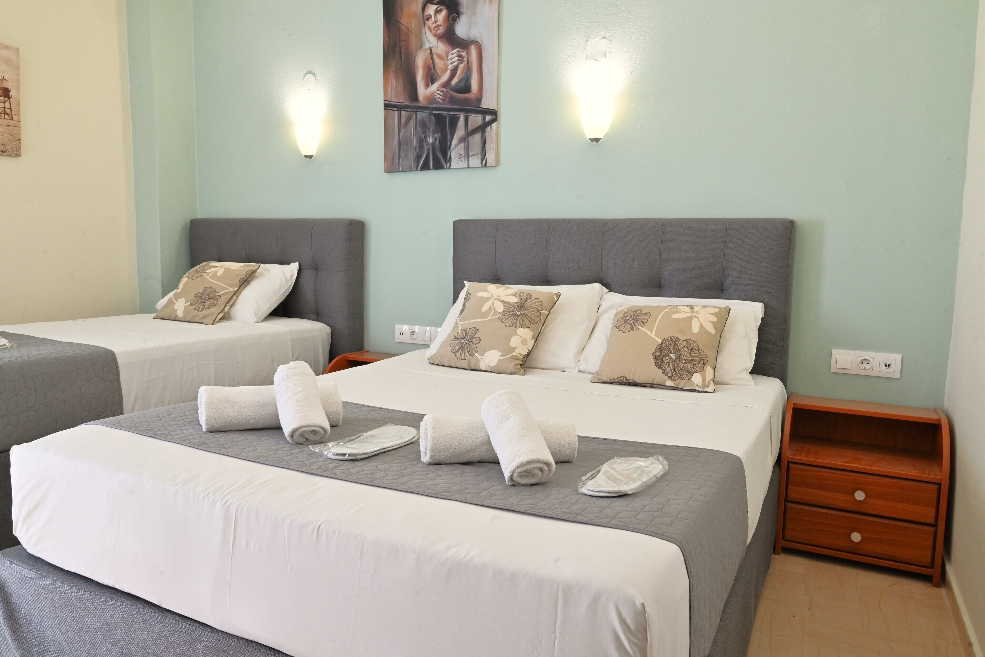 economy triple room, 1 bedroom, patio | 1 bedroom, in-room safe, iron/ironing board, free wifi