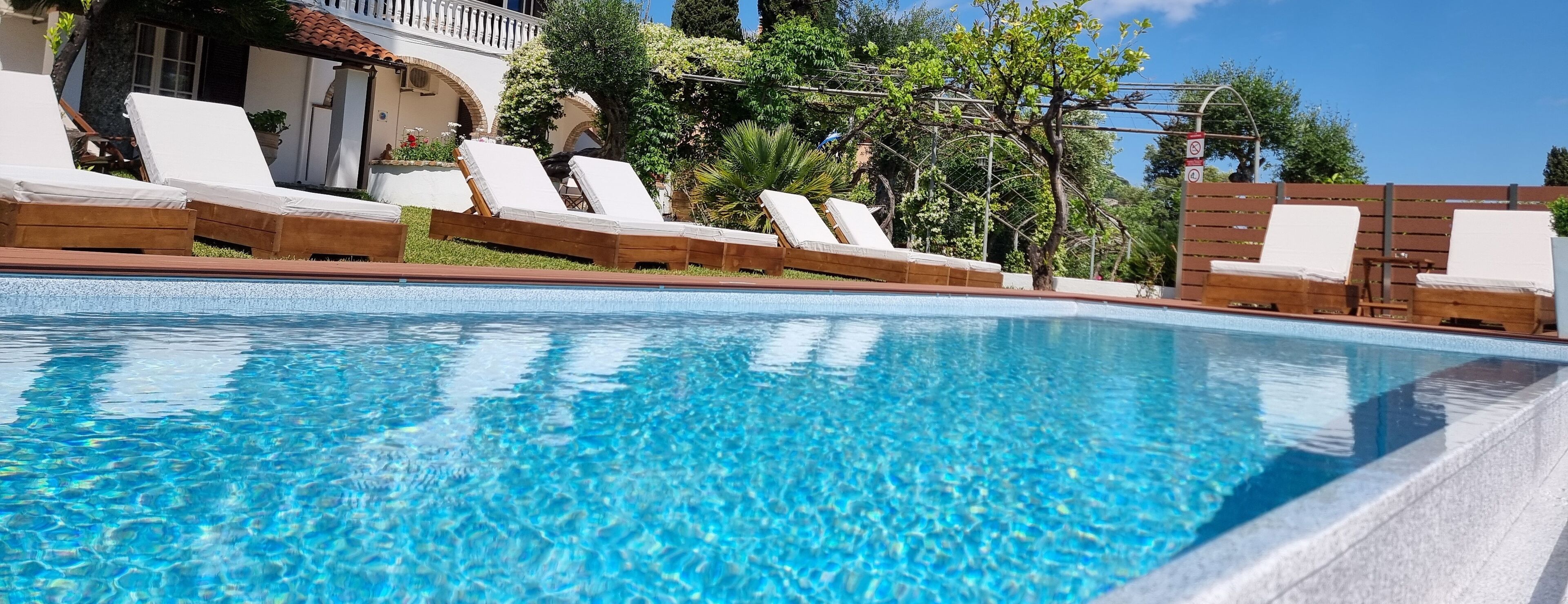 outdoor pool, pool loungers