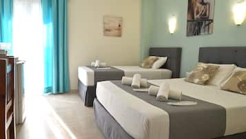 Caja fuerte, tabla de planchar con plancha, wifi gratis y ropa de cama