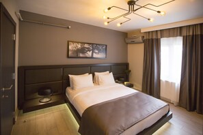 Suite, 2 Bedrooms | Premium bedding, in-room safe, individually decorated