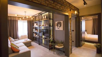 Suite, 2 Schlafzimmer | 1 Schlafzimmer, hochwertige Bettwaren, Zimmersafe, individuell dekoriert