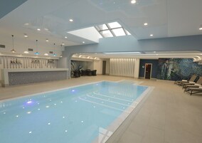 Indoor pool, open 10:00 AM to 10:00 PM, sun loungers