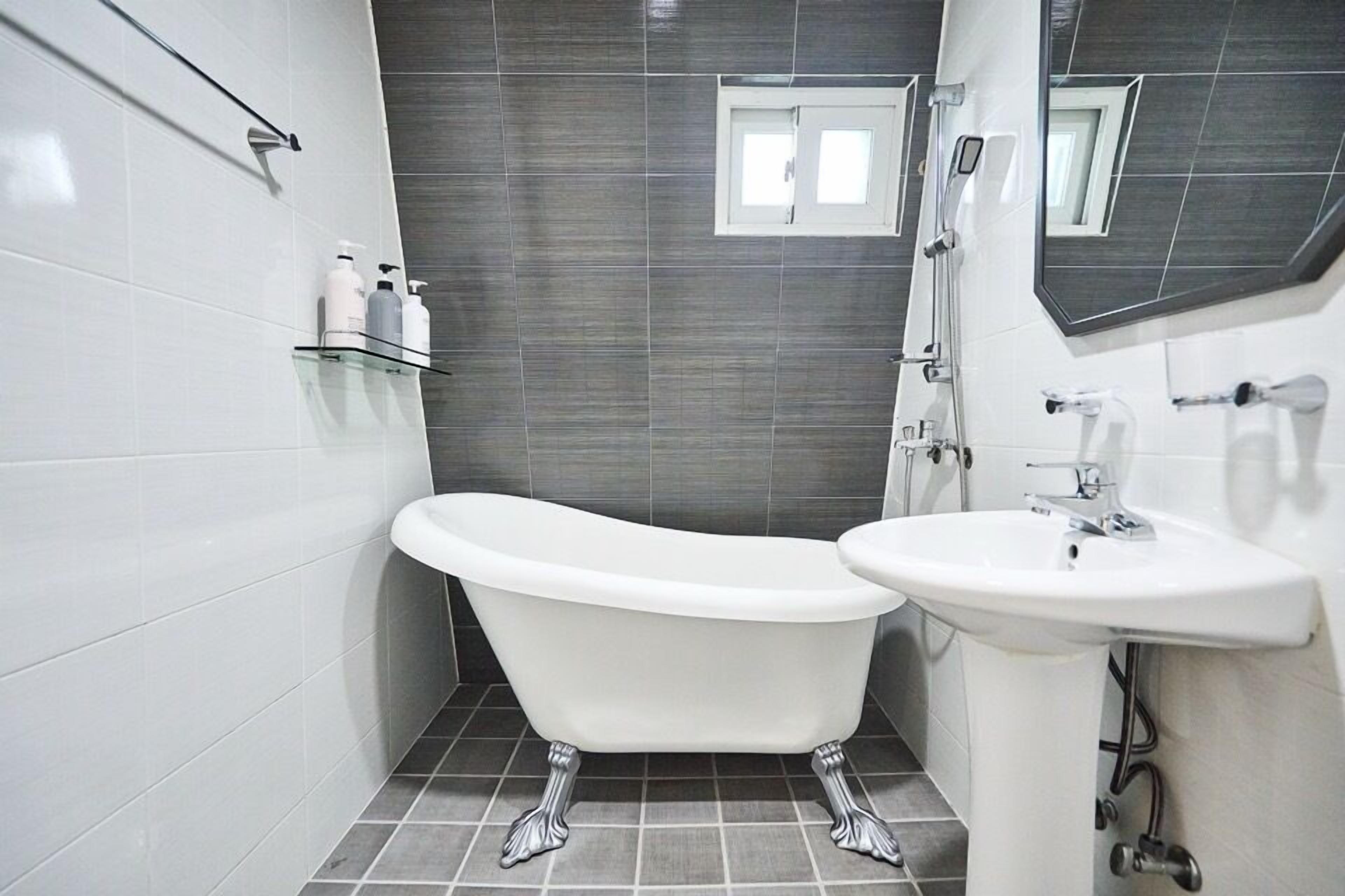 business twin (light breakfast for 2 people, free access of community room - 1 hour per stay) | bathroom | free toiletries, hair dryer, slippers, heated floors