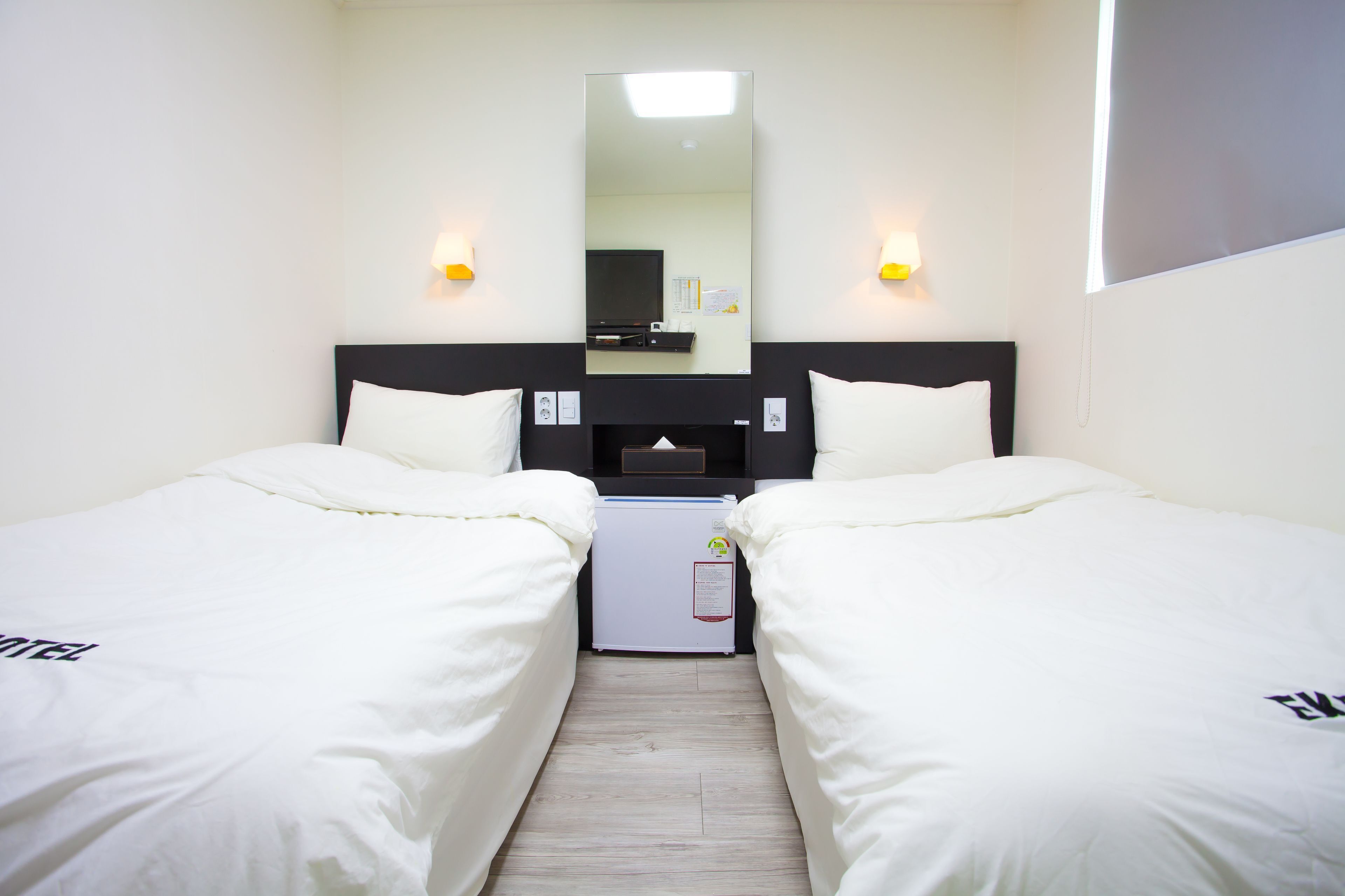 Premium bedding, desk, blackout drapes, iron/ironing board