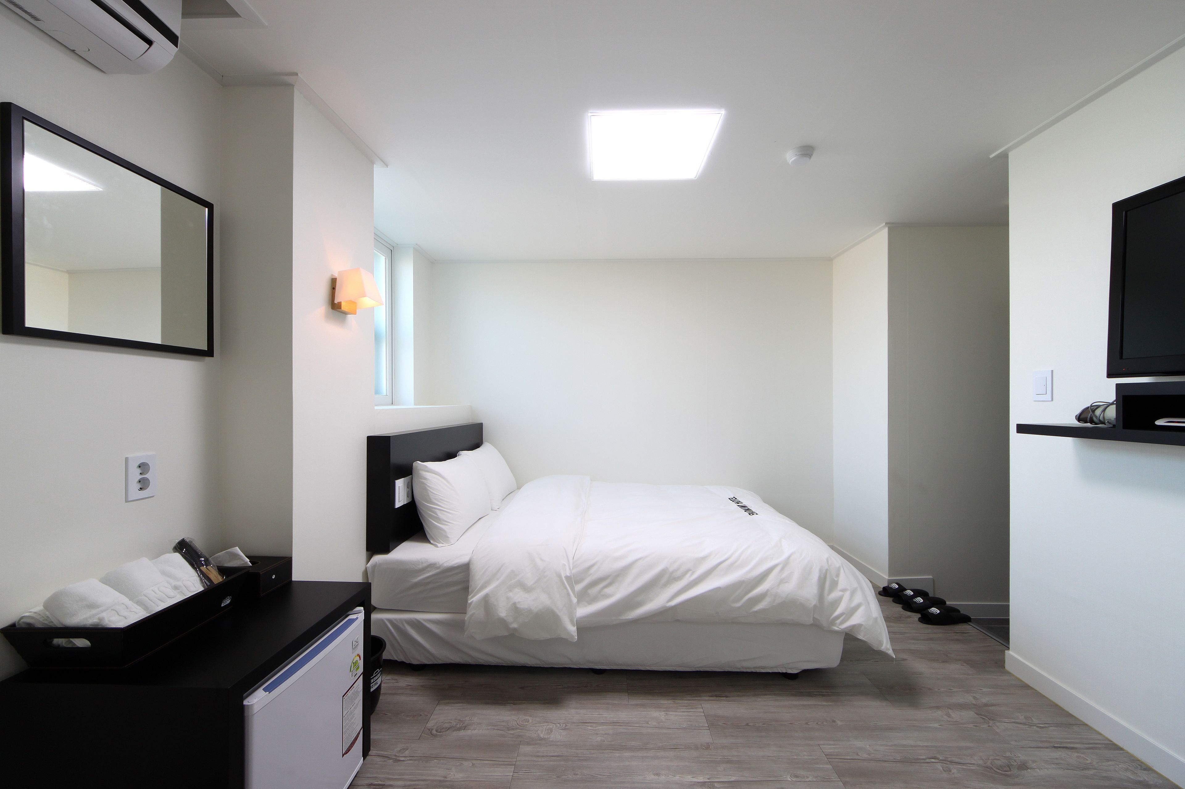 Premium bedding, desk, blackout drapes, iron/ironing board