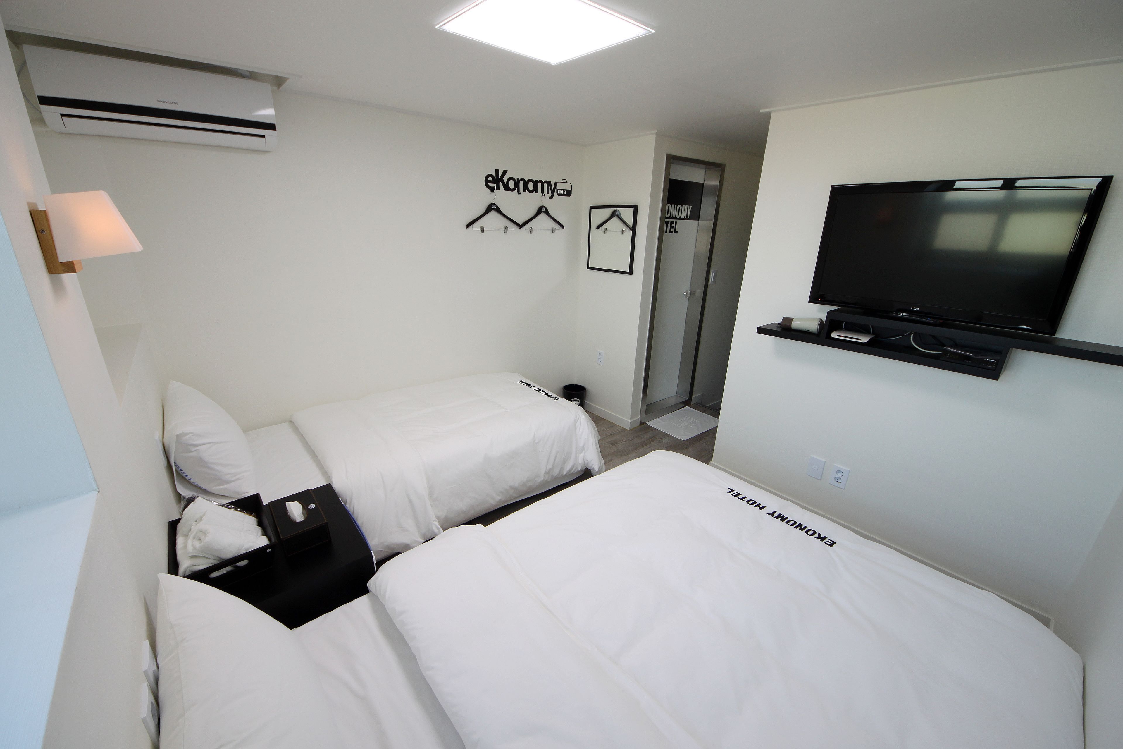Premium bedding, desk, blackout drapes, iron/ironing board