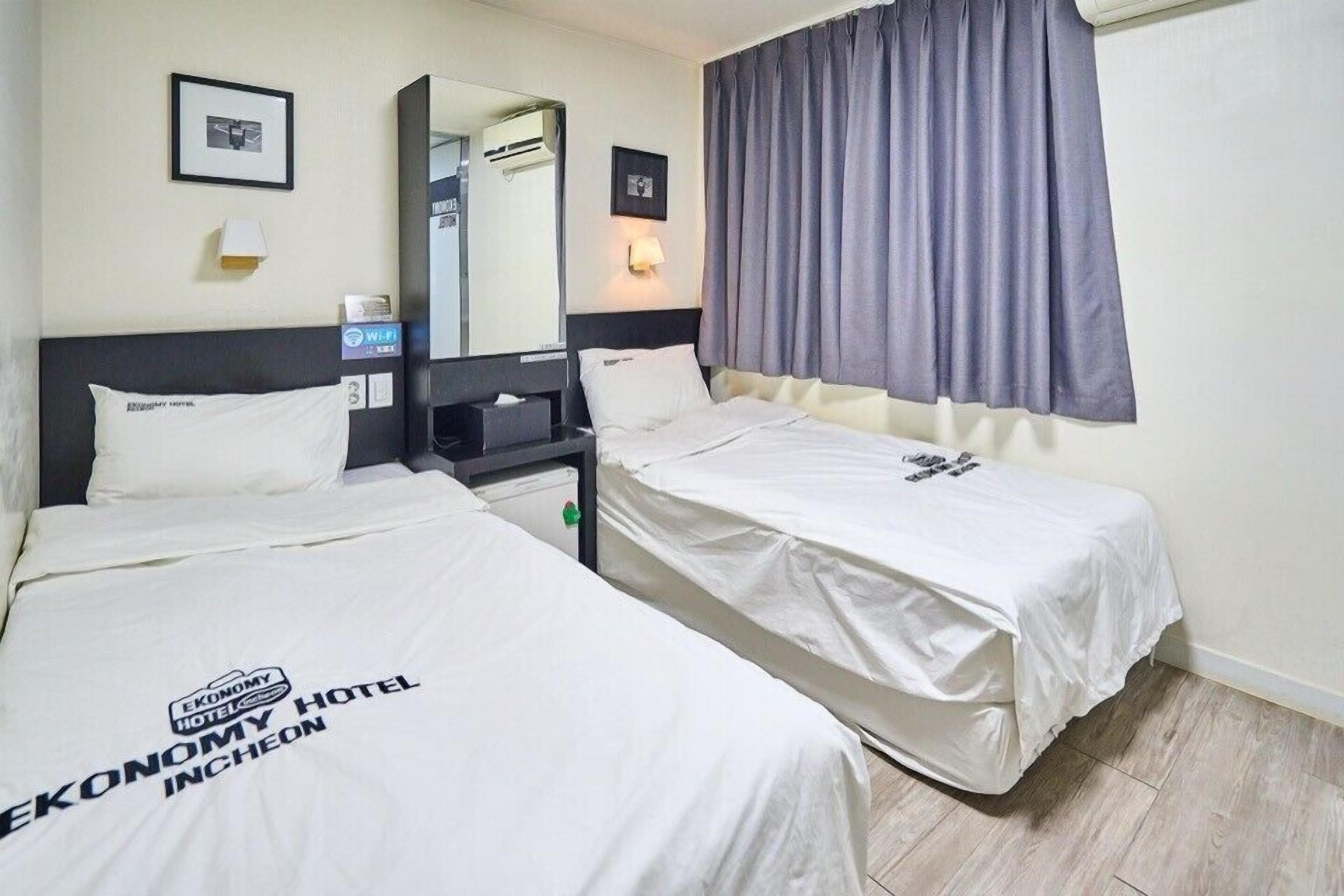 economy twin (light breakfast for 2 people, free access of community room - 1 hour per stay) | 1 bedroom, premium bedding, desk, blackout curtains