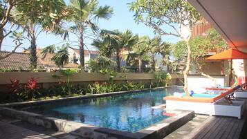 Outdoor pool, open 8:00 AM to 8:00 PM, sun loungers