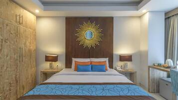 Deluxe Room | Minibar, in-room safe, blackout curtains, free WiFi