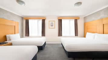 Standard Quadruple Room, Non Smoking | Desk, laptop workspace, iron/ironing board, free WiFi