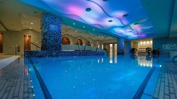 Indoor pool, open 8 AM to 10 PM, pool loungers