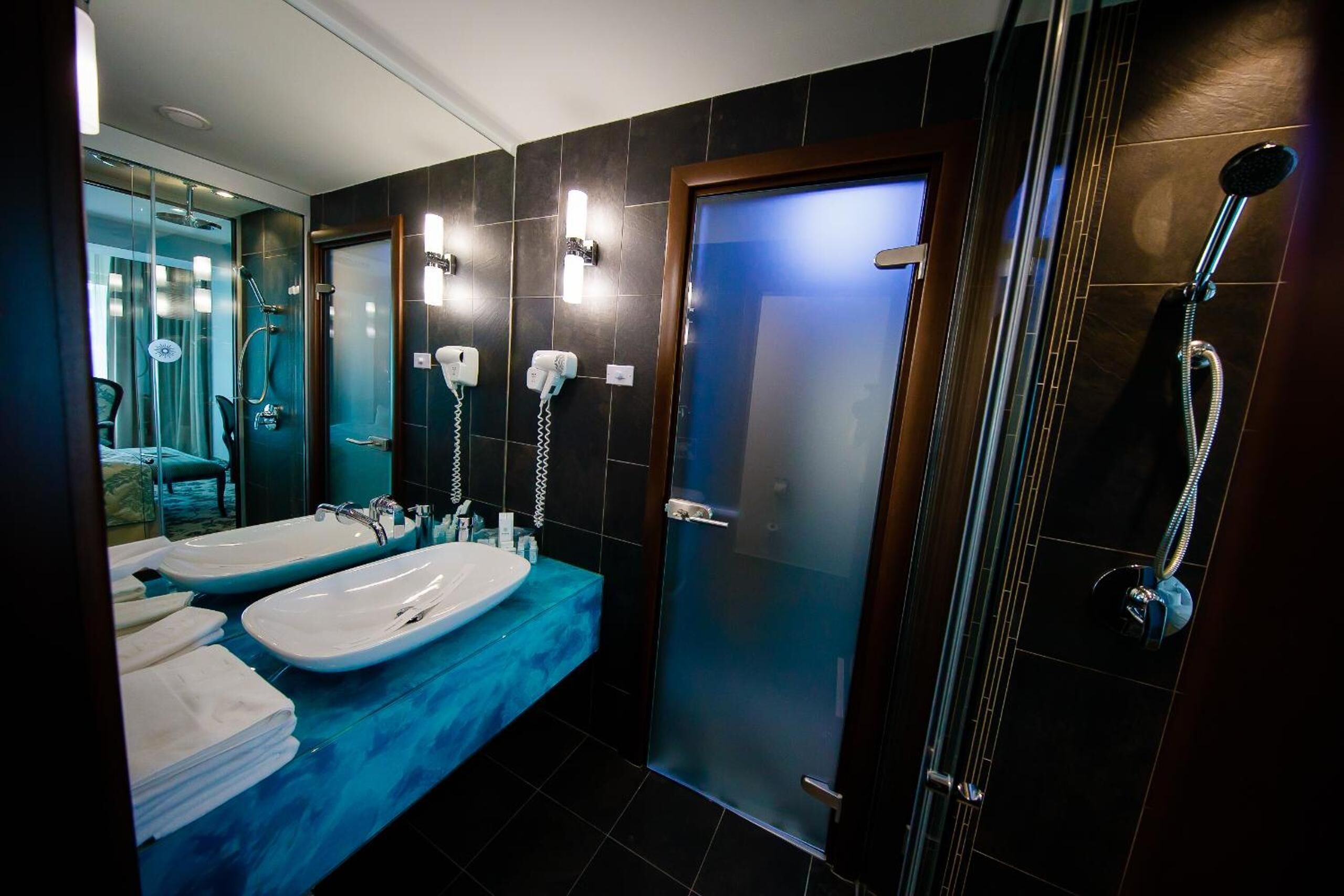 shower, free toiletries, hair dryer, bathrobes