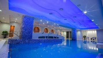 Indoor pool, open 8 AM to 10 PM, pool loungers