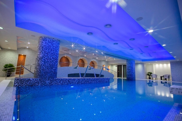 Indoor pool, open 8 AM to 10 PM, pool loungers