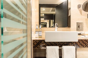 Eco-friendly toiletries, hair dryer, bathrobes, slippers