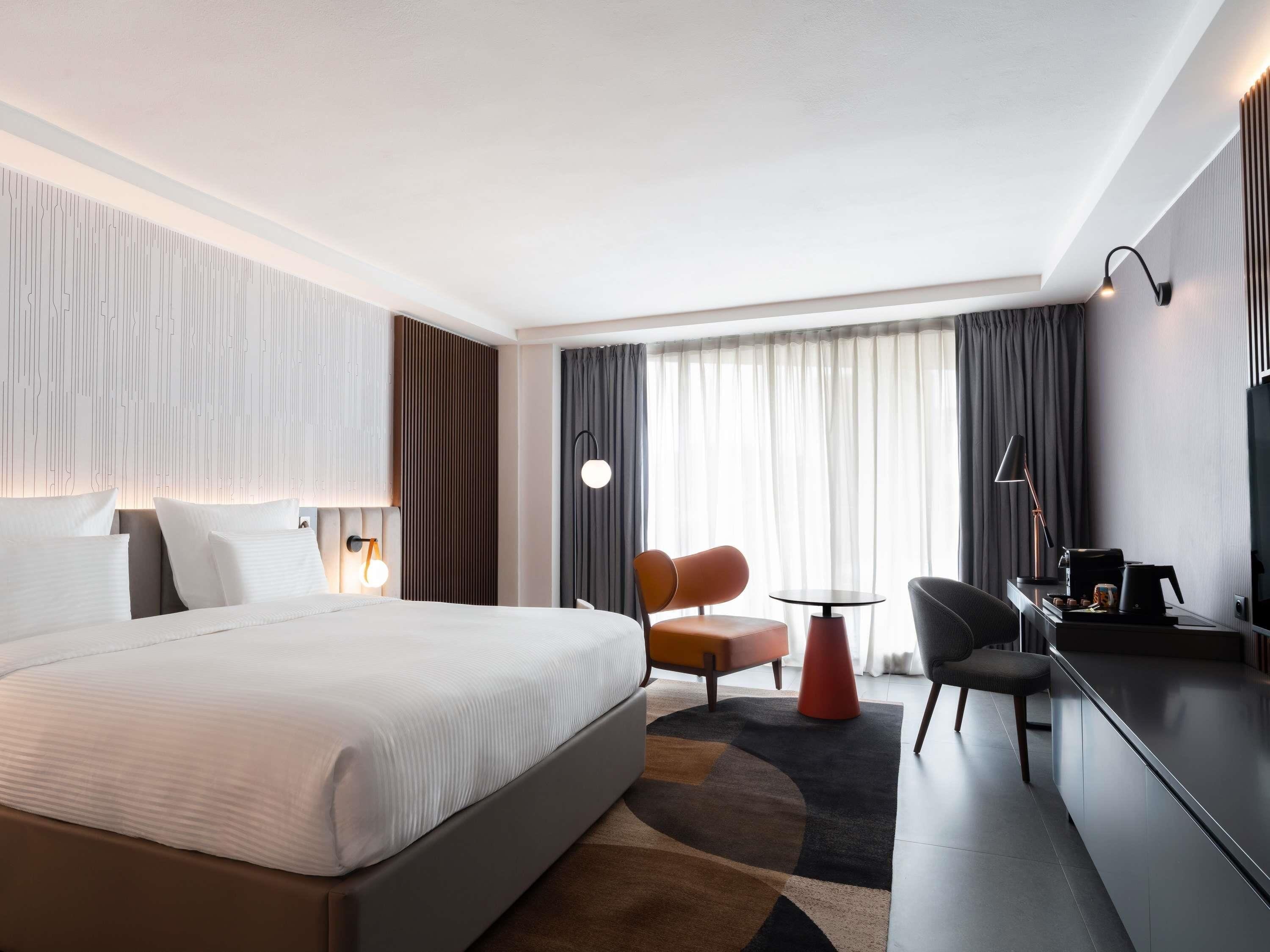 Premium bedding, pillow-top beds, minibar, in-room safe