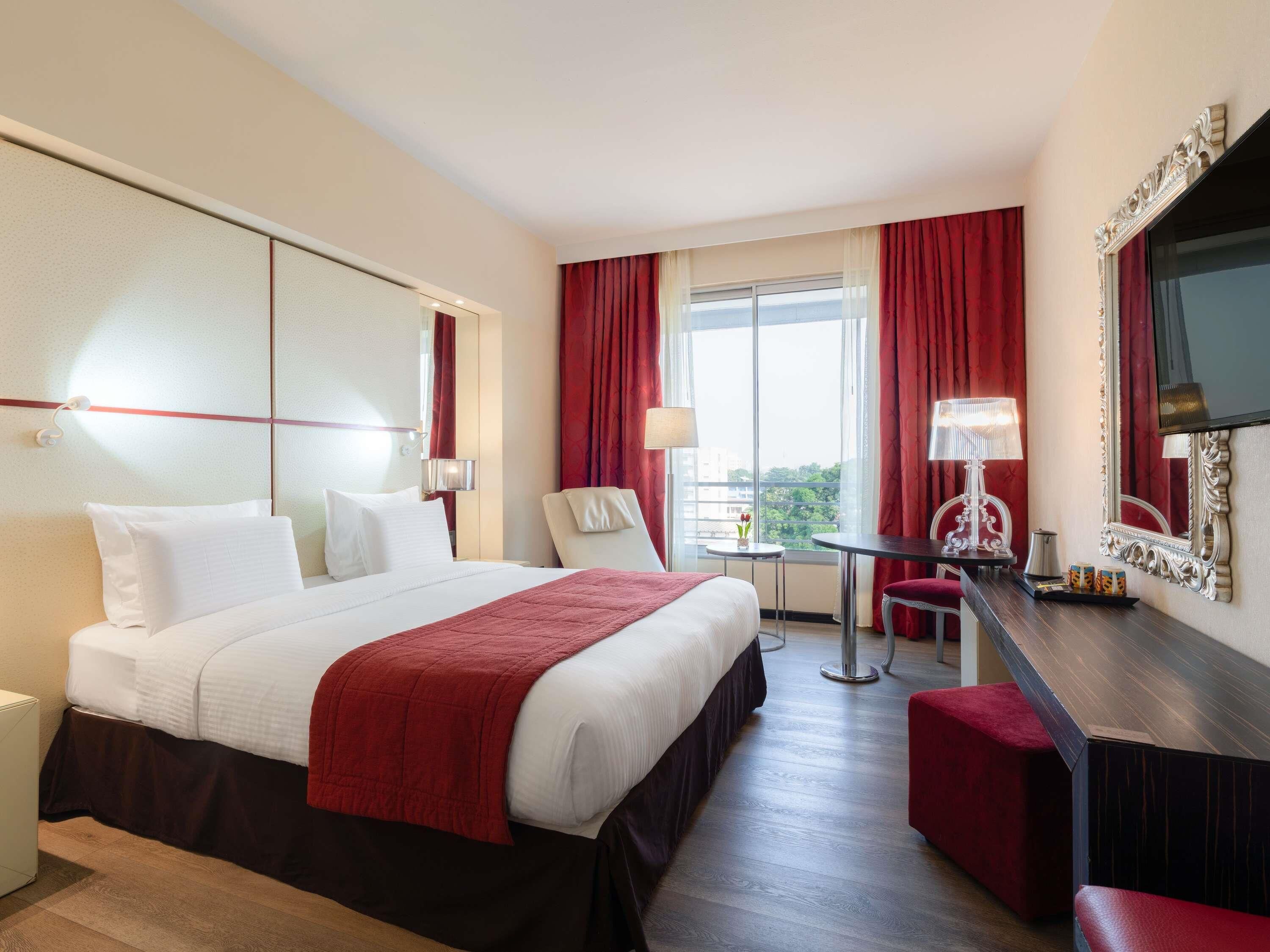 Premium bedding, pillow-top beds, minibar, in-room safe