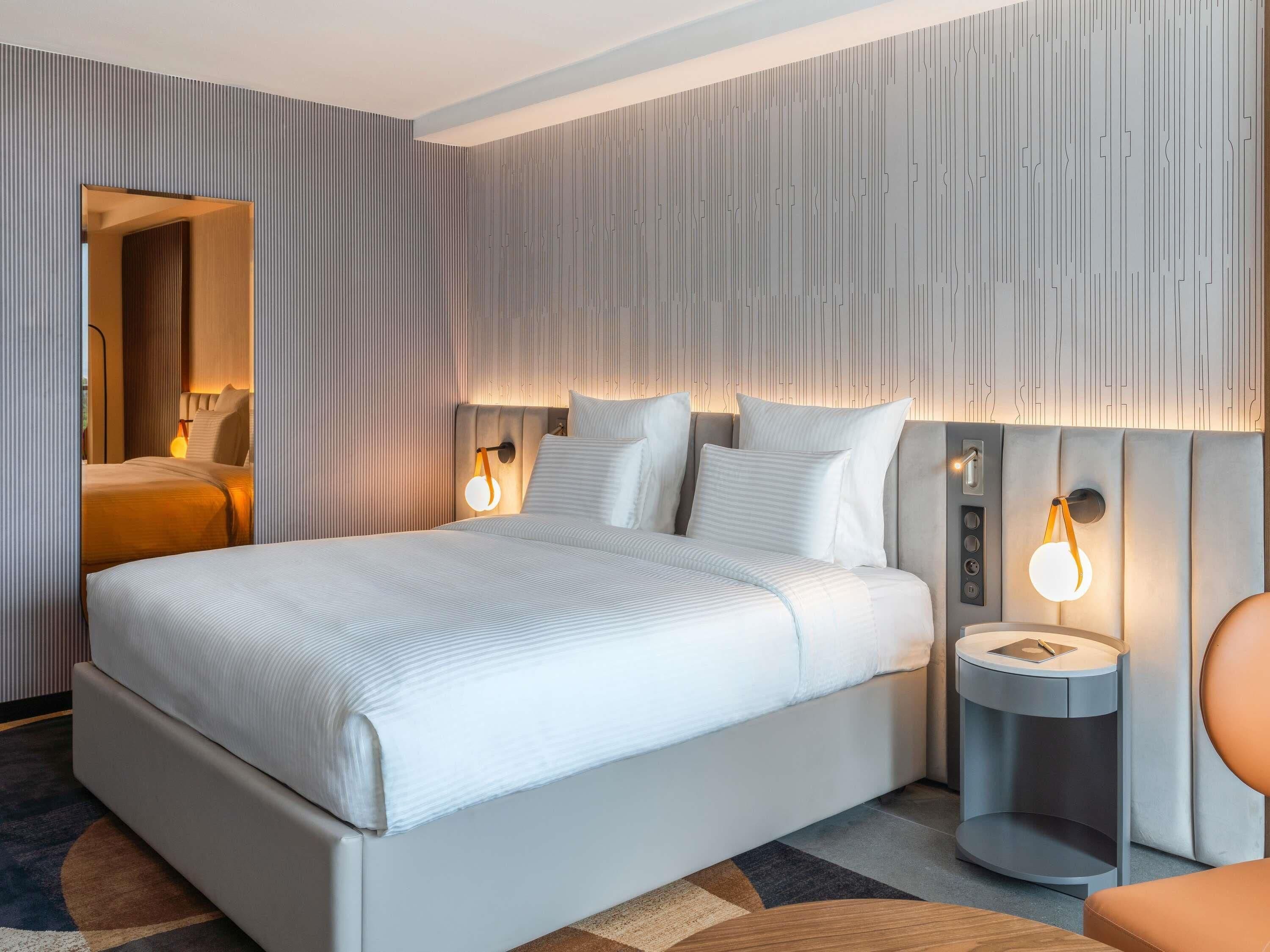 Premium bedding, pillow-top beds, minibar, in-room safe