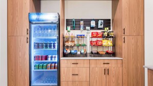 A kitchenette with a refrigerator stocked with beverages, a microwave, and a coffee machine. - Best Western Niantic - New London/Mystic Area (Niantic)