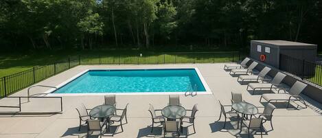 Seasonal outdoor pool, open 8:00 AM to 8:00 PM, pool umbrellas