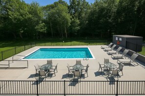 Seasonal outdoor pool, open 8:00 AM to 8:00 PM, pool umbrellas