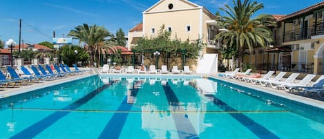 Seasonal outdoor pool, open 10 AM to 8 PM, pool umbrellas, sun loungers