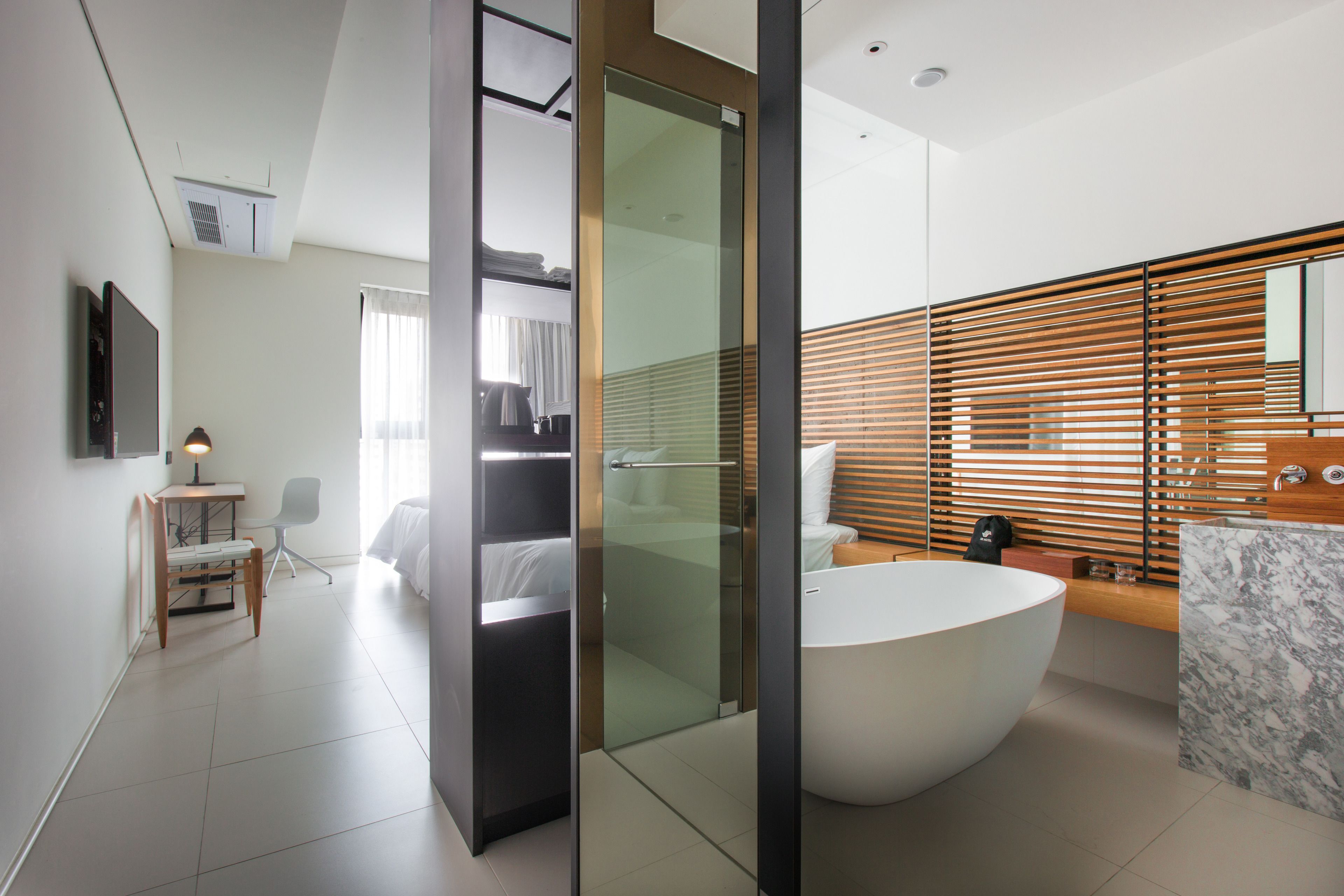 rainfall showerhead, hair dryer, bathrobes, slippers