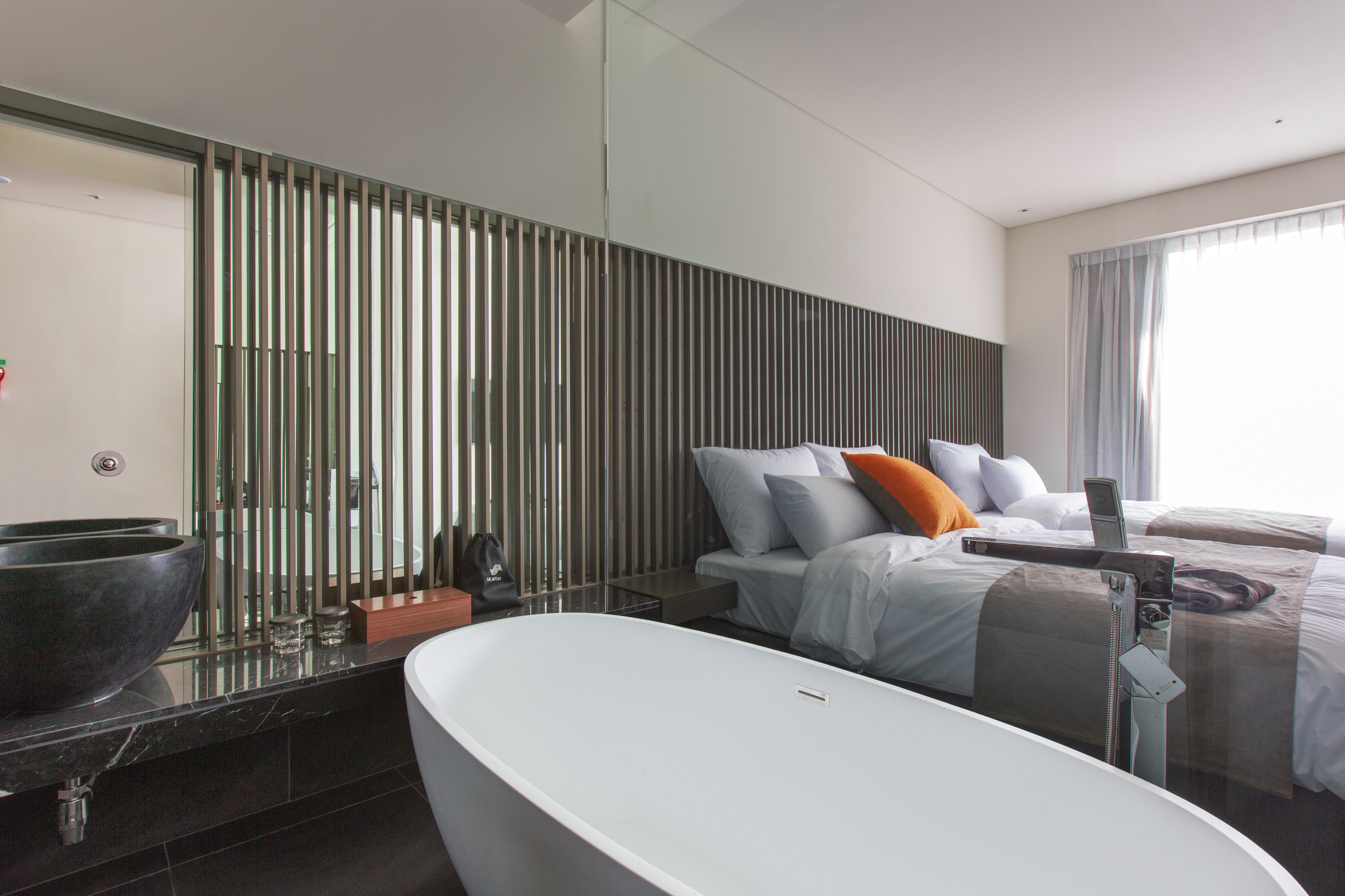 rainfall showerhead, hair dryer, bathrobes, slippers