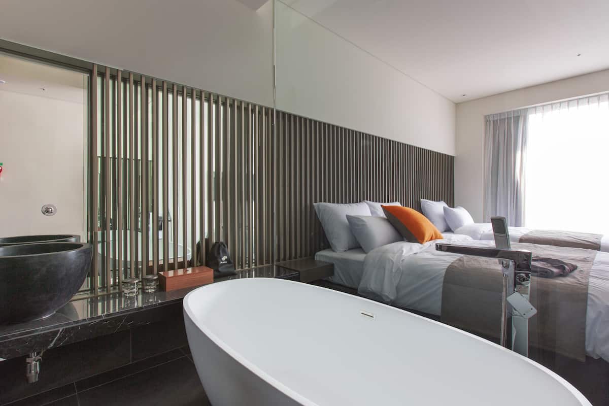 rainfall showerhead, hair dryer, bathrobes, slippers