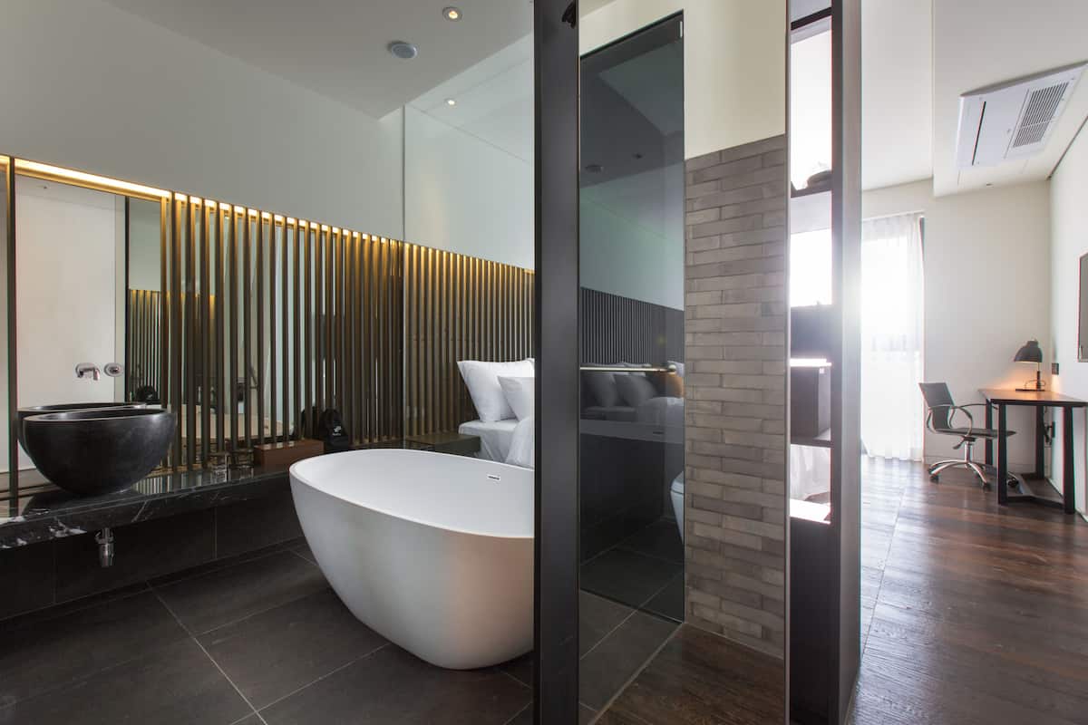 rainfall showerhead, hair dryer, bathrobes, slippers