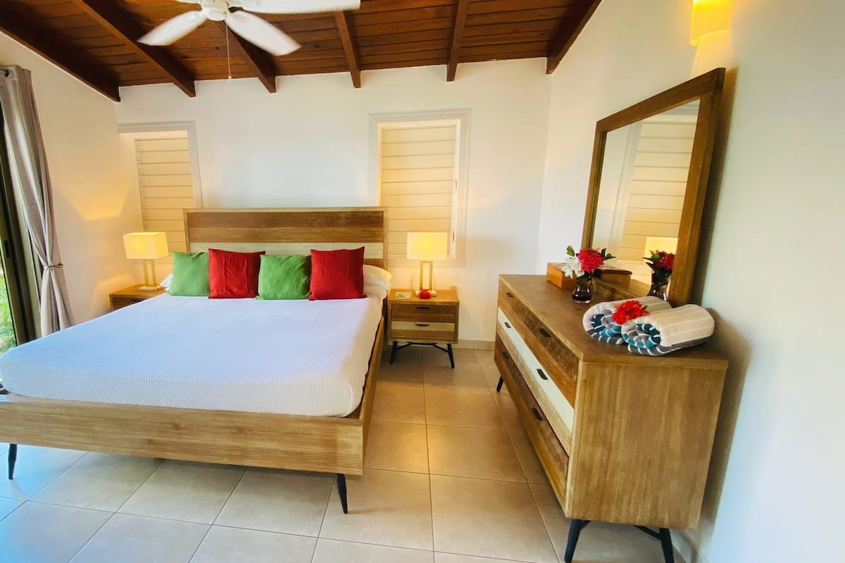 Luxury Suite, 2 Bedrooms, Kitchen, Beachfront | 1 bedroom, in-room safe, individually decorated, individually furnished