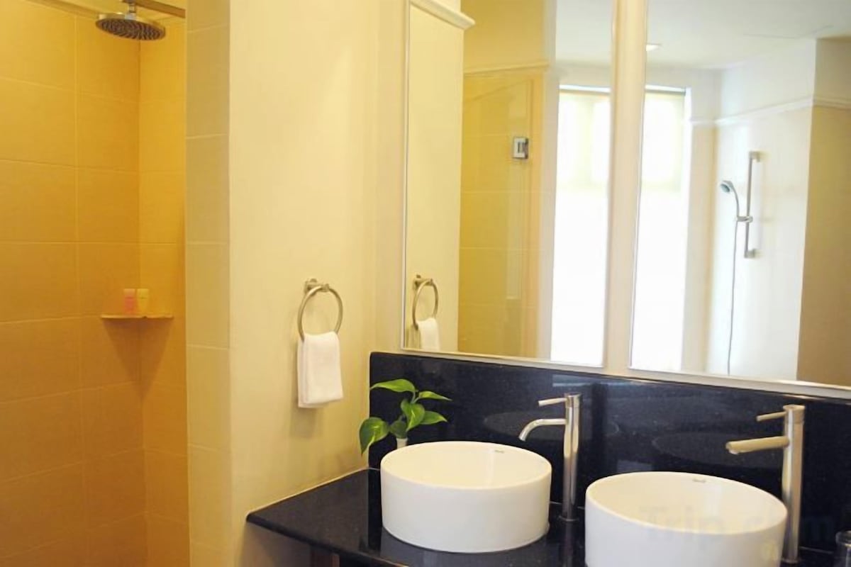 Bathroom | Shower, hair dryer, slippers, towels