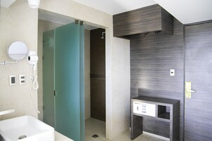 Shower, rainfall showerhead, hair dryer, towels