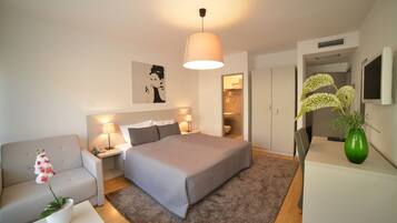 In-room safe, desk, laptop workspace, blackout curtains