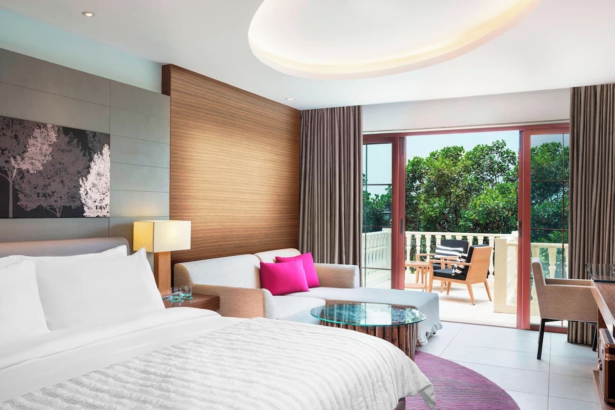 Suite, 1 King Bed, Non Smoking, Balcony | 1 bedroom, premium bedding, pillow-top beds, minibar