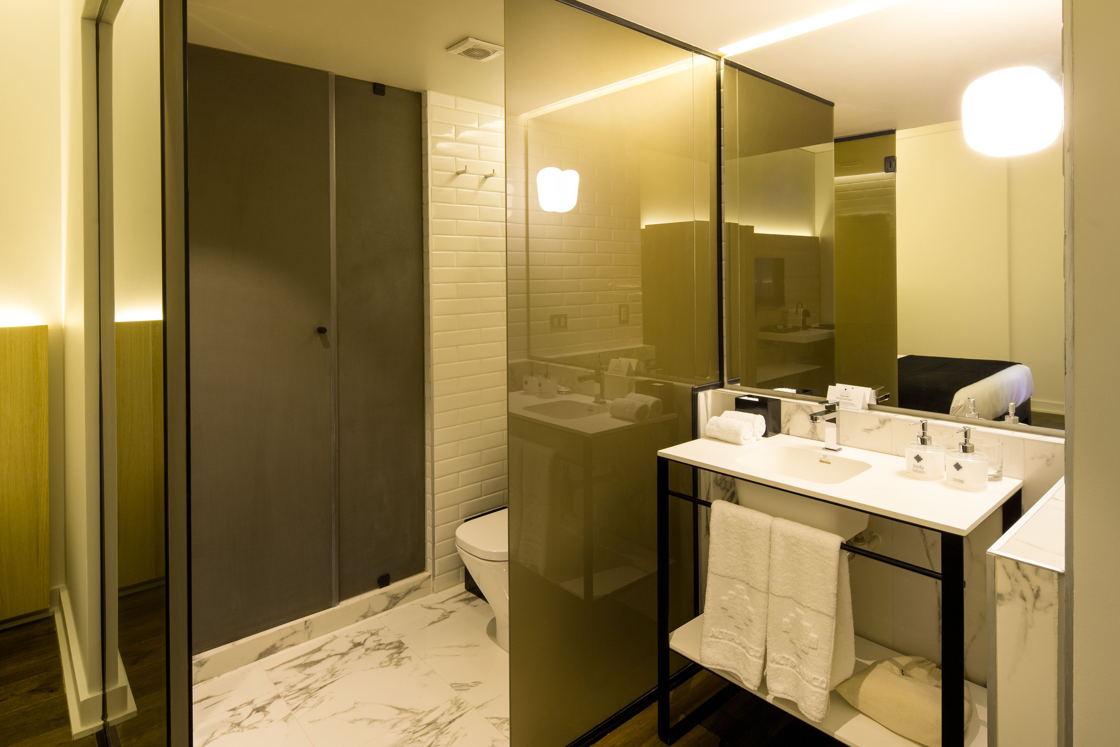 superior double room | bathroom | free toiletries, hair dryer, towels