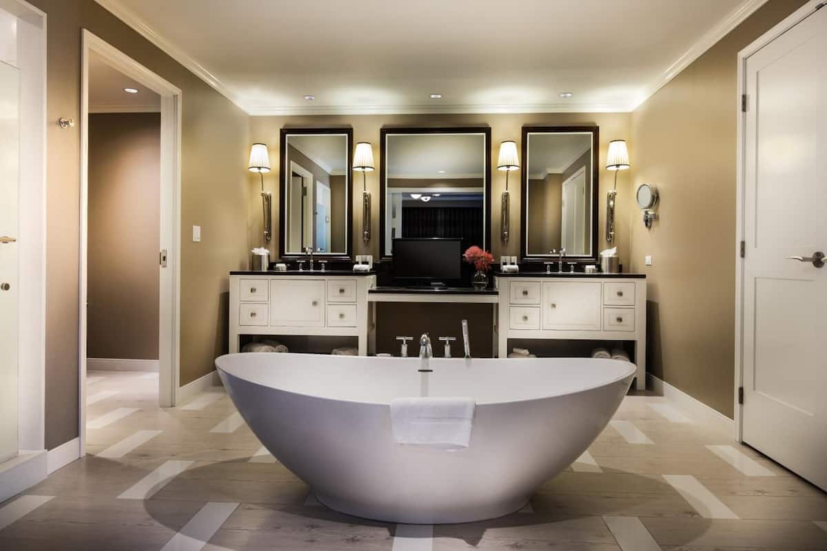 separate bathtub and shower, free toiletries, hair dryer, towels