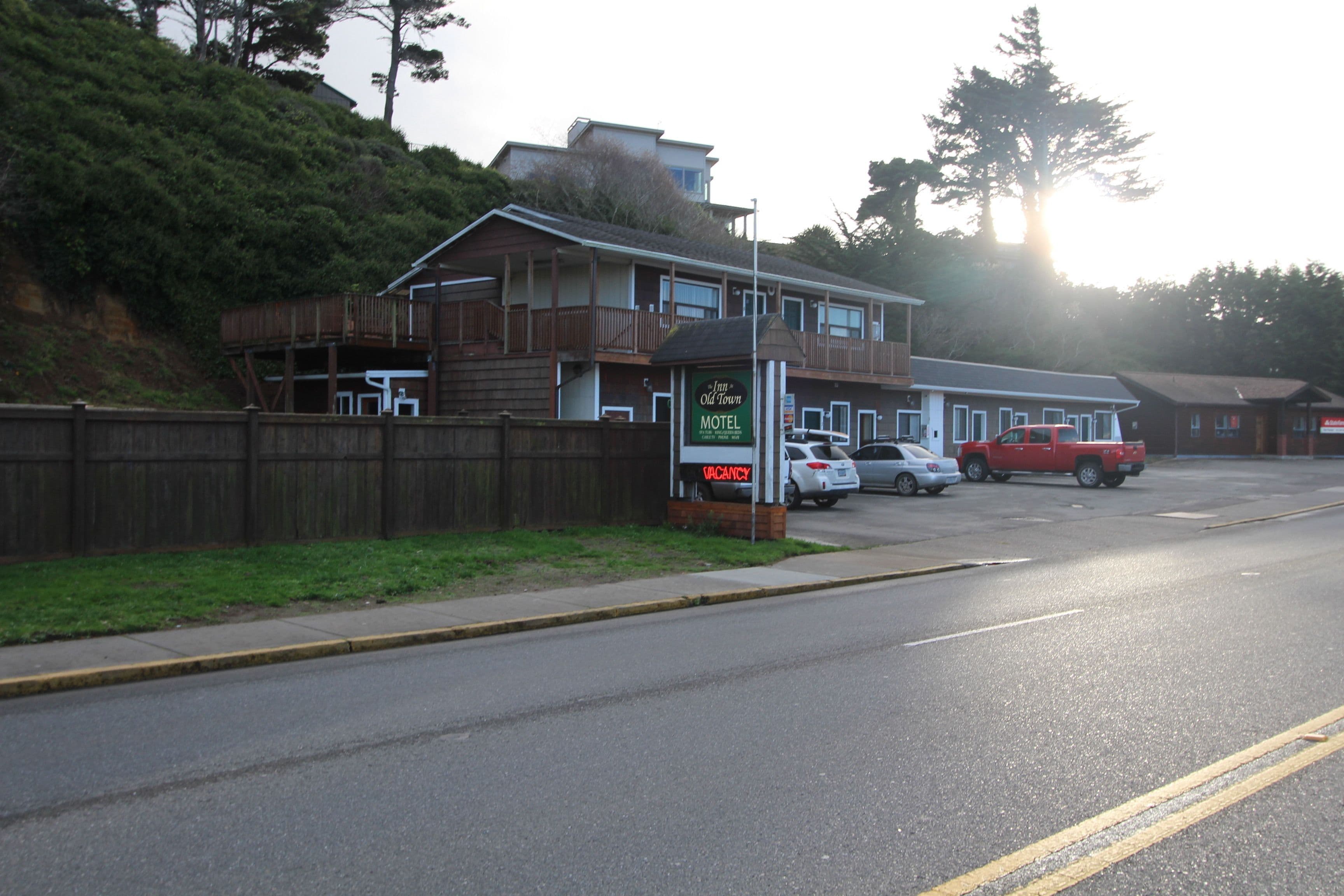 A motel with a signboard indicating vacancy.