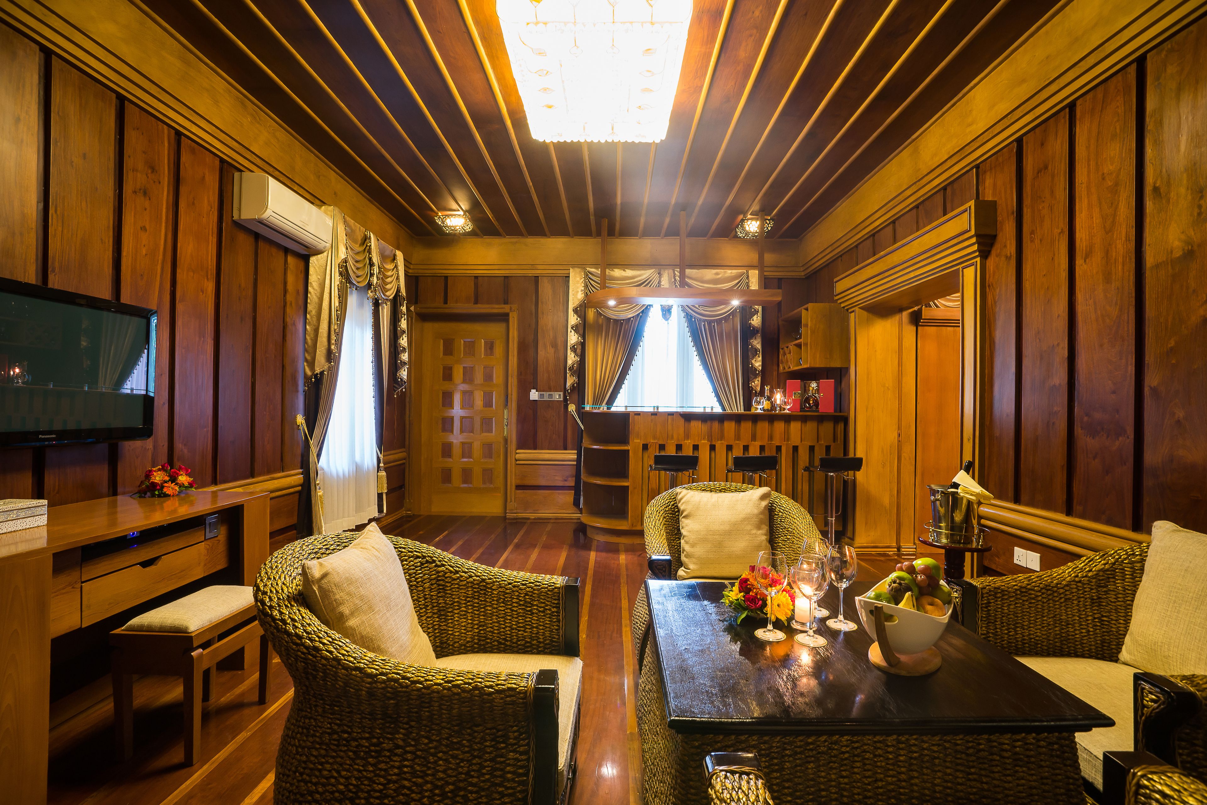 standard suite, 1 king bed, non smoking, royal villa suite | living area | 42-inch flat-screen tv with satellite channels, tv, dvd player