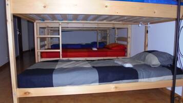 A bunk bed with a lower bunk and a top bunk.