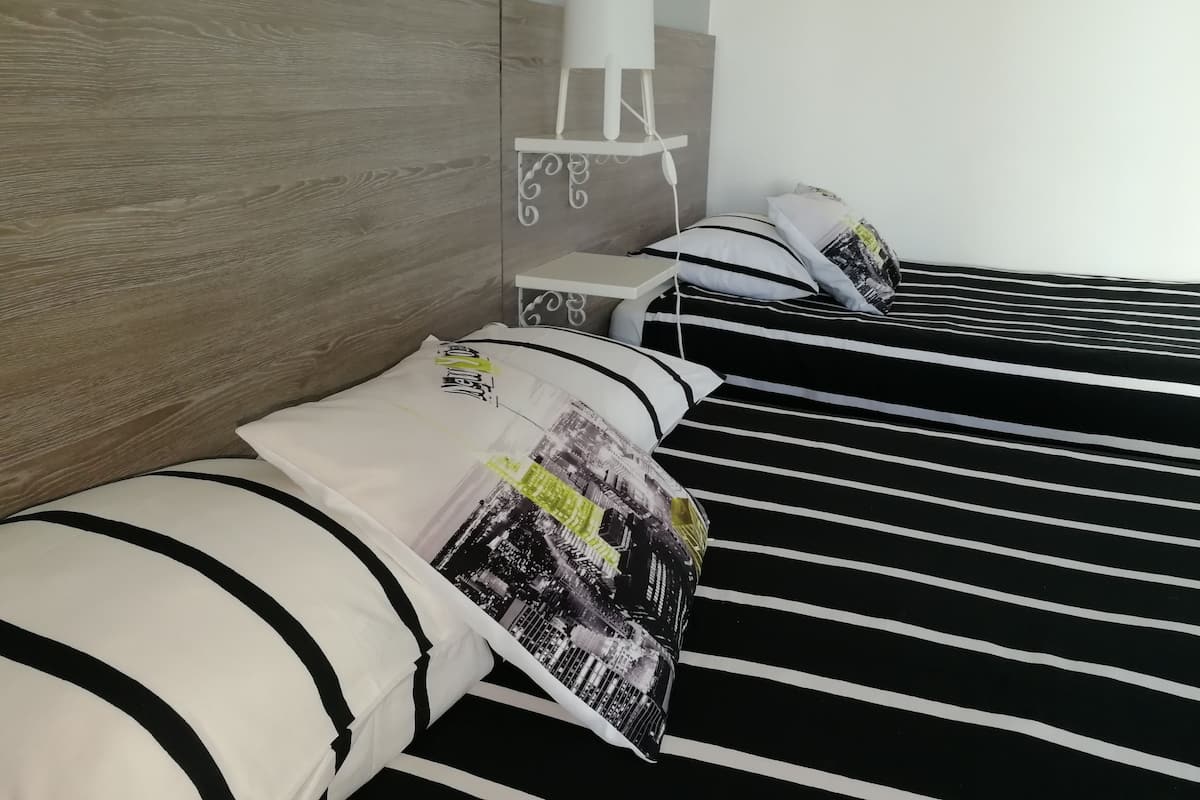 Desk, soundproofing, rollaway beds, free WiFi