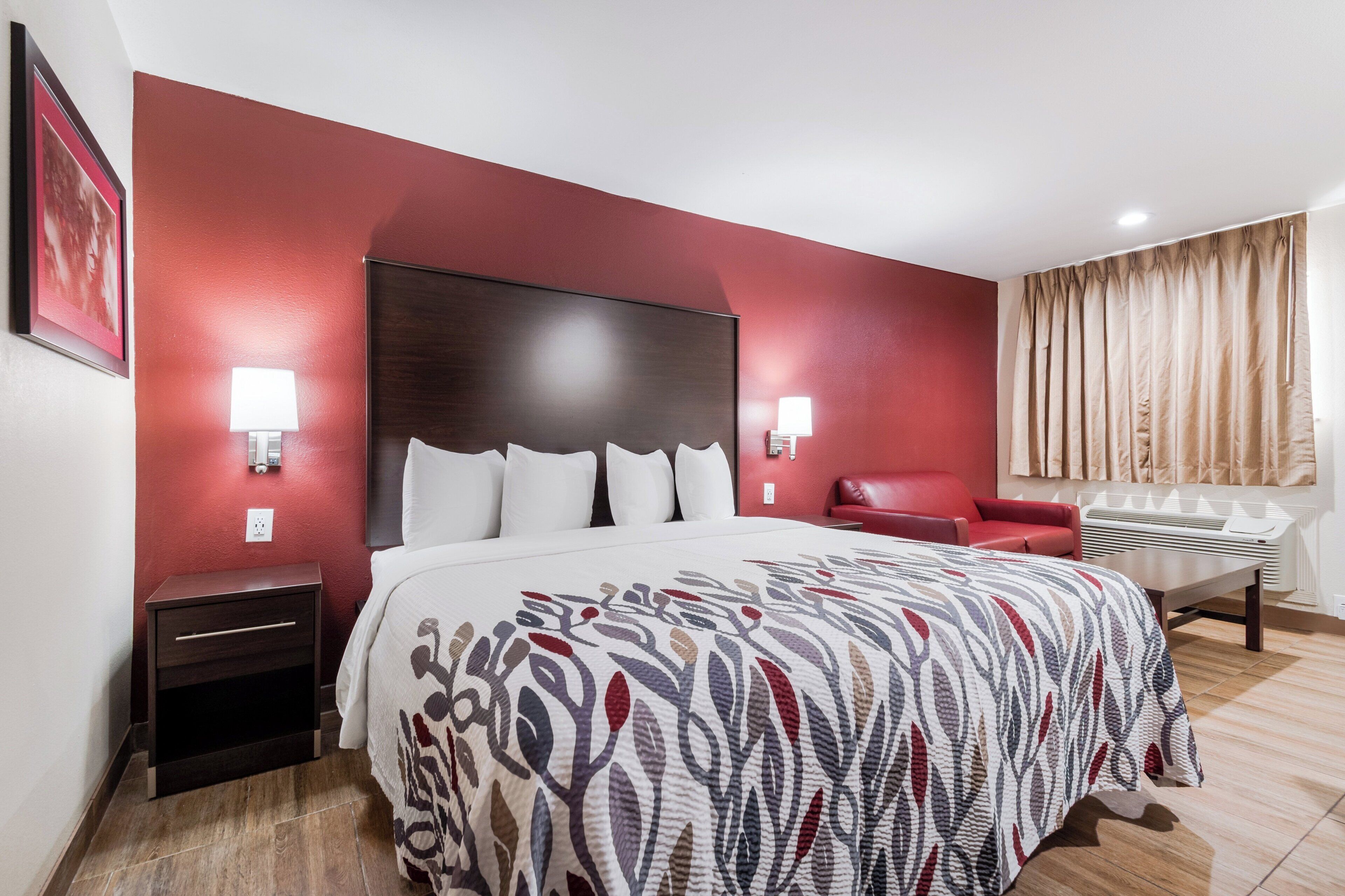 Blackout drapes, cribs (free), WiFi (free), bed sheets