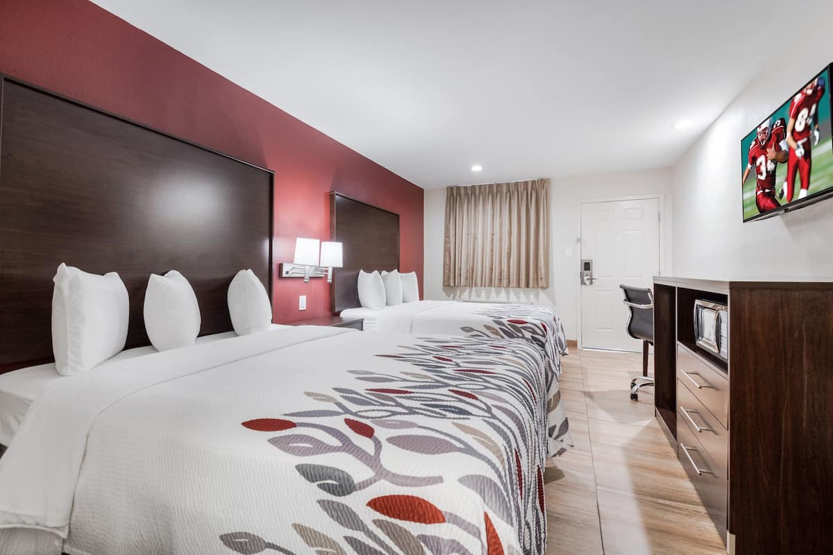 Blackout drapes, cribs (free), WiFi (free), bed sheets