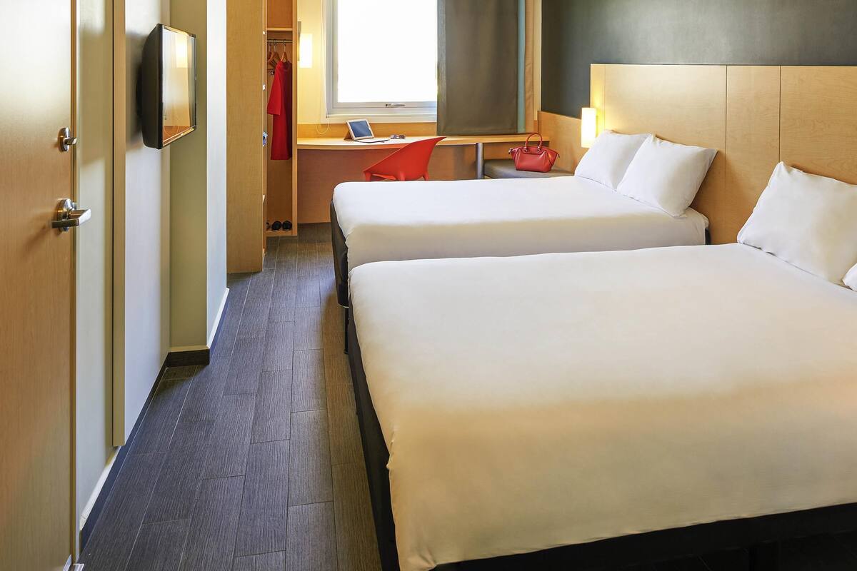 standard twin room, 2 double beds | in-room safe, desk, iron/ironing board, free wifi