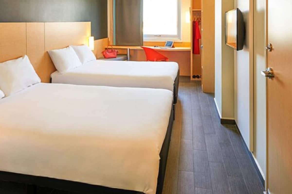 standard twin room, 2 double beds | in-room safe, desk, iron/ironing board, free wifi