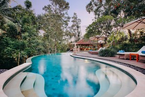 2 outdoor pools, a natural pool, open 7 AM to 9:00 PM, pool umbrellas - BeingSattvaa Luxury Ubud (Ubud)