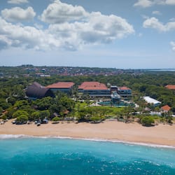 Relax on the beach with stunning views of the city skyline.