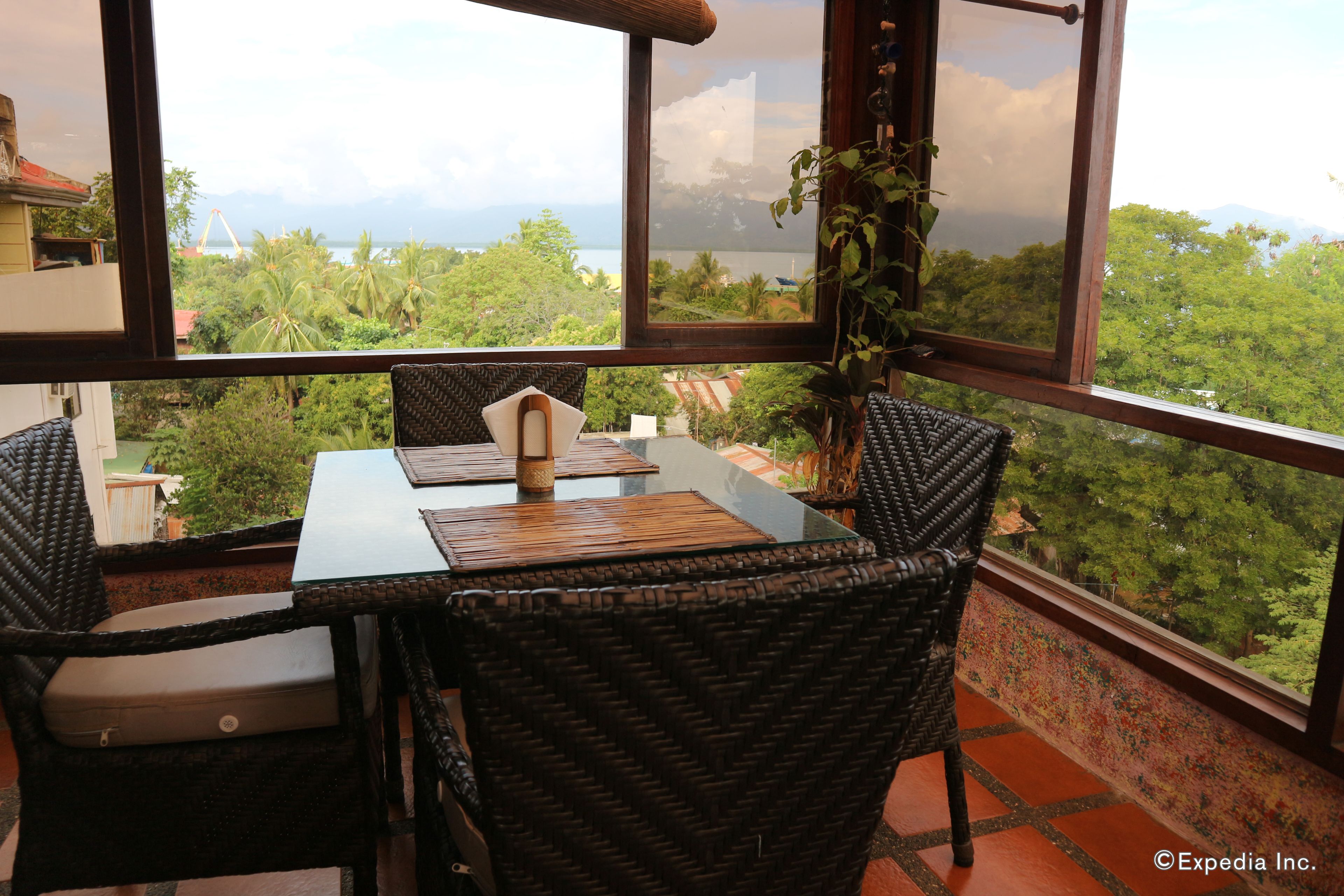 Breakfast, lunch, dinner served; local cuisine 