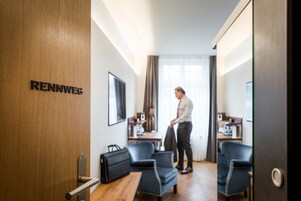 Premium bedding, down comforters, memory foam beds, in-room safe