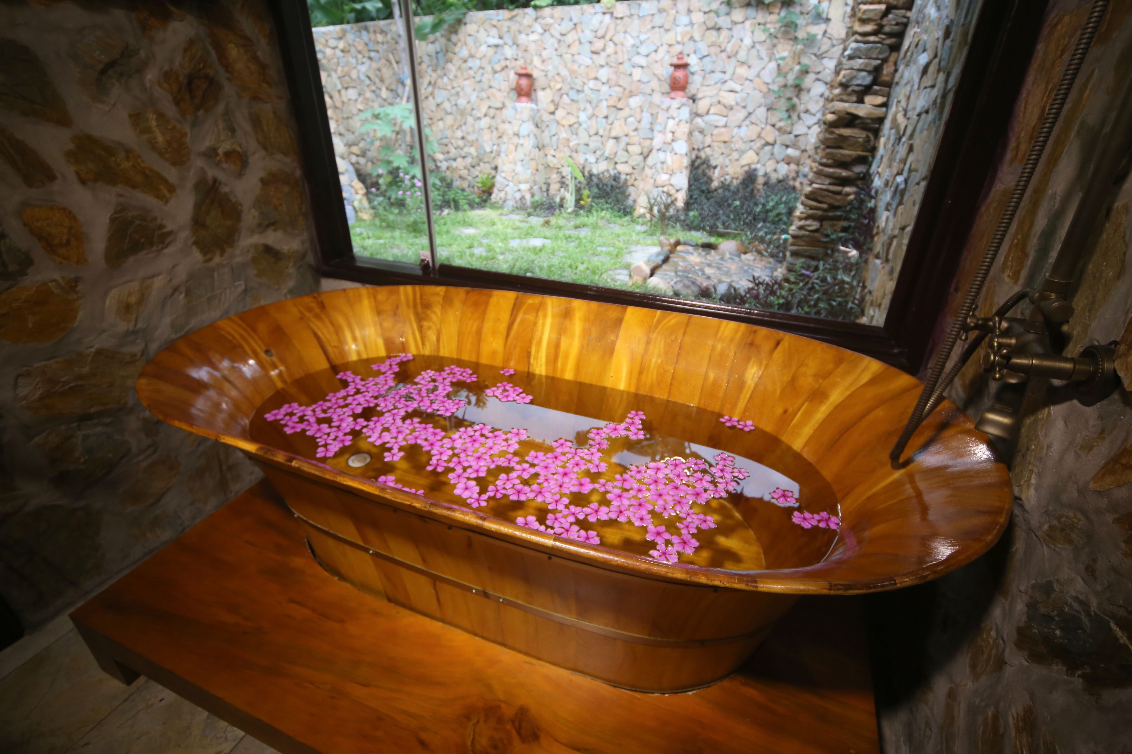 deluxe room, valley view | bathroom | shower, free toiletries, hair dryer, slippers